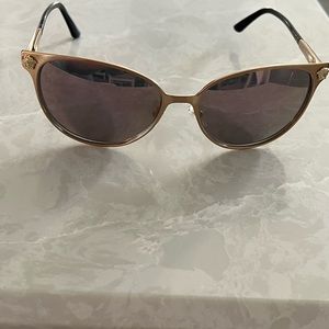 Versace women’s sunglasses model 2168 with case and purchase box.